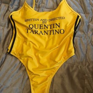 Quentin Tarantino cheeky yellow one piece